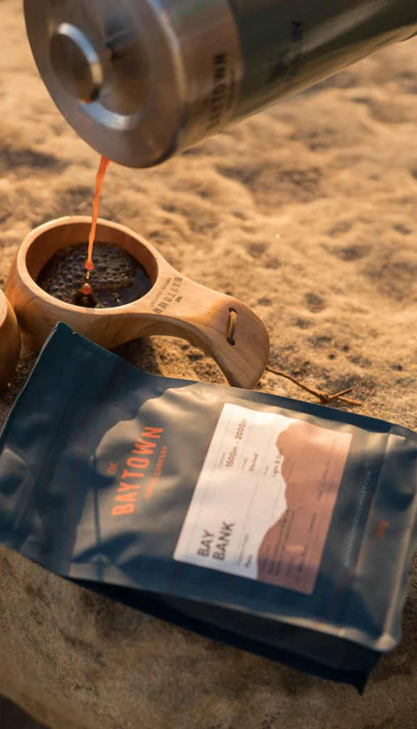 Coffee being poured on the beach